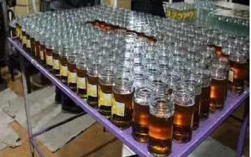 کشف 2 تن عسل فاقد پروانه بهداشتی در کنگاور 