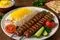 طرز تهیه چلوکباب؛ شاهکار بی‌رقیب سفره ایرانی/ رازهای طعم ماندگار محبوب‌ترین غذای ایران