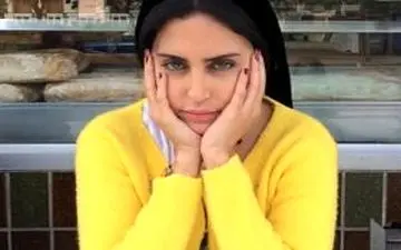 عکس/دست گل مدل زن ایرانی ساکن دبی برای الناز شاکردوست