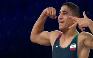 کشتی آزاد قهرمانی جهان/ صعود عموزاد به مرحله یک چهارم نهایی