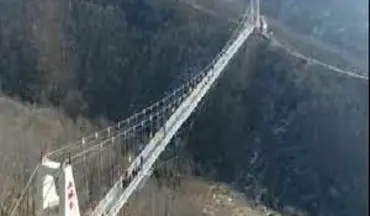 افتتاح طولانی ترین پل شیشه ای جهان در چین + فیلم