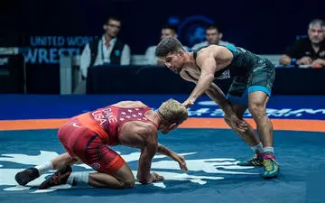 مدال برنز بر گردن امامی