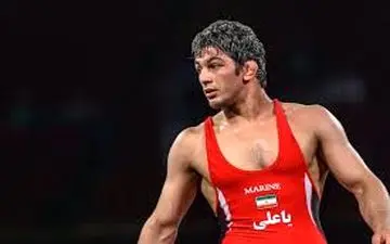 علت شکست یزدانی برابر کشتی‌گیر آمریکایی چه بود؟ 