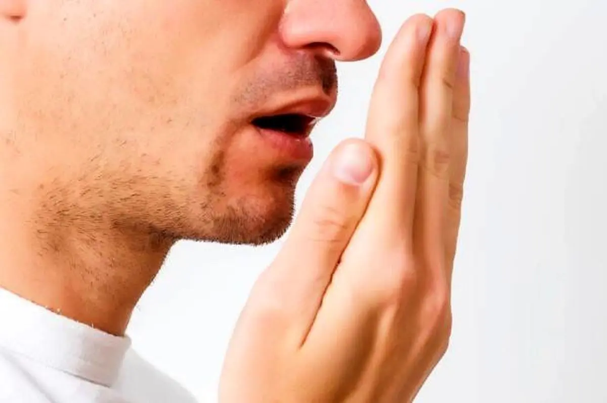 عواملی که باعث بوی بد دهان میشوند