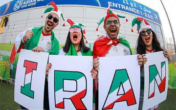 تصویری بسیار زیبا از یک هوادار ایرانی در دیدار مقابل ژاپن