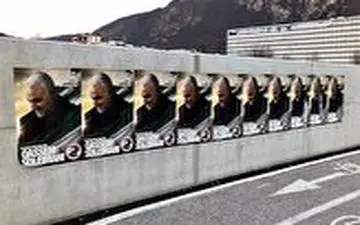 تصاویر حمید معصومی‌نژاد از نصب پوسترهای سردار سلیمانی در شهرهای بزرگ ایتالیا