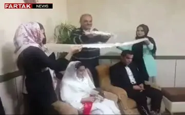 قند ساییدن جواد خیابانی روی سر عروس و داماد در سرپل ذهاب + فیلم