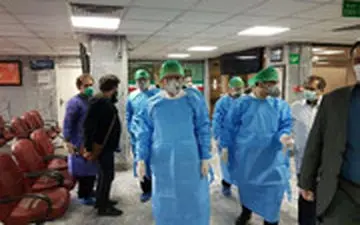 حضور اسحاق جهانگیری در بیمارستان امام حسین(ع) با لباس ویژه