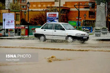 بارش باران و آب گرفتگی معابر در همدان + تصاویر