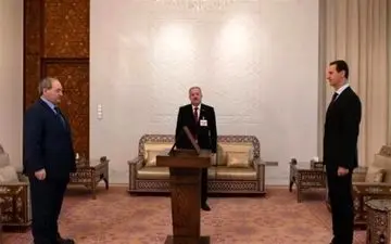 ادای سوگند فیصل المقداد در حضور بشار اسد