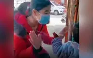 ملاقات پرستار چینی با فرزندش از پشت شیشه + فیلم