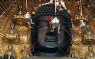 گردگیری مجسمه غول‌پیکر بودا در ژاپن
