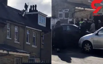  3جوان هنگام فرار از خانه زن تنها در پشت بام گرفتار شدند و از پلیس کمک خواستند!+فیلم 