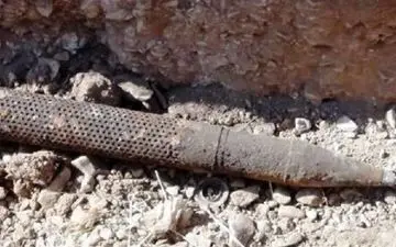 کشف گلوله توپ دوران دفاع مقدس در روستای کوییک سرپل‌ذهاب 