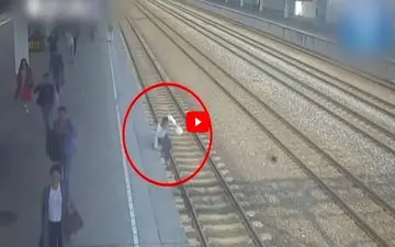لحظه ناکام ماندن مسافر قطار برای خودکشی! +فیلم 