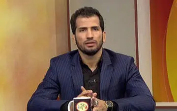 قهرمان کشتی المپیک: مربی باید سواد داشته باشد