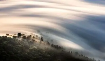  عکس منتخب نشنال جئوگرافیک | دریای ابر بر فراز کوه ها