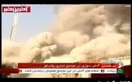 لحظه فروریختن ساختمان پلاسکو در تهران که از شبکه خبر به صورت زنده پخش شد+فیلم
