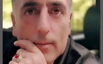 ترور مامور پلیس گلوگاه جلوی در خانه اش + عکس
