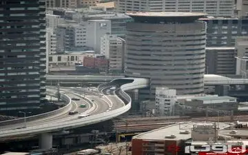 عبور حیرت انگیز بزرگراه از داخل یک ساختمان+عکس