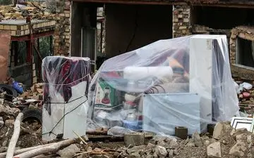 عکس/ دردسرهای زلزله‌زدگان در روزهای بارانی