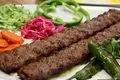 کباب کوبیده با گوشت گوساله؛ دستور رستورانی برای طعمی حرفه‌ای در خانه
