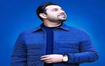 عکس زمستانی احسان خواجه‌امیری و پسرش