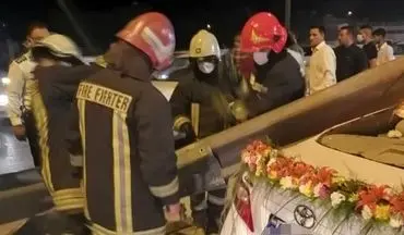 عروس و داماد مصدوم با تلاش آتش‌نشانان نجات یافتند