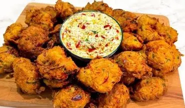 طرز تهیه پاکورا سیب‌ زمینی؛ اسنک هندی خوشمزه با سبزیجات معطر