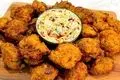 طرز تهیه پاکورا سیب‌ زمینی؛ اسنک هندی خوشمزه با سبزیجات معطر