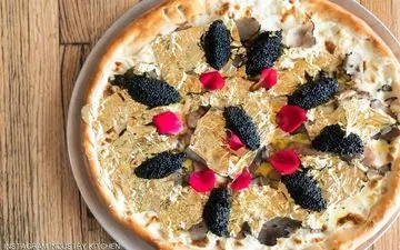 فروش پیتزا با روکش طلا در اصفهان برای جذب مشتری بود