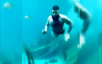 تعقیب و گریر پلیس و متهم در اکواریوم بزرگ+ فیلم