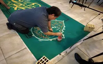  برگزاری آئین «کتیبه‌نویسی» در کرمانشاه