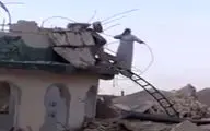 اذان گفتن موذن عراقی بر ویرانه‌های مسجدی در موصل + فیلم