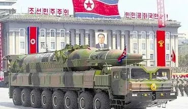 رهبر کره شمالی در کنار موشک بالستیک +عکس